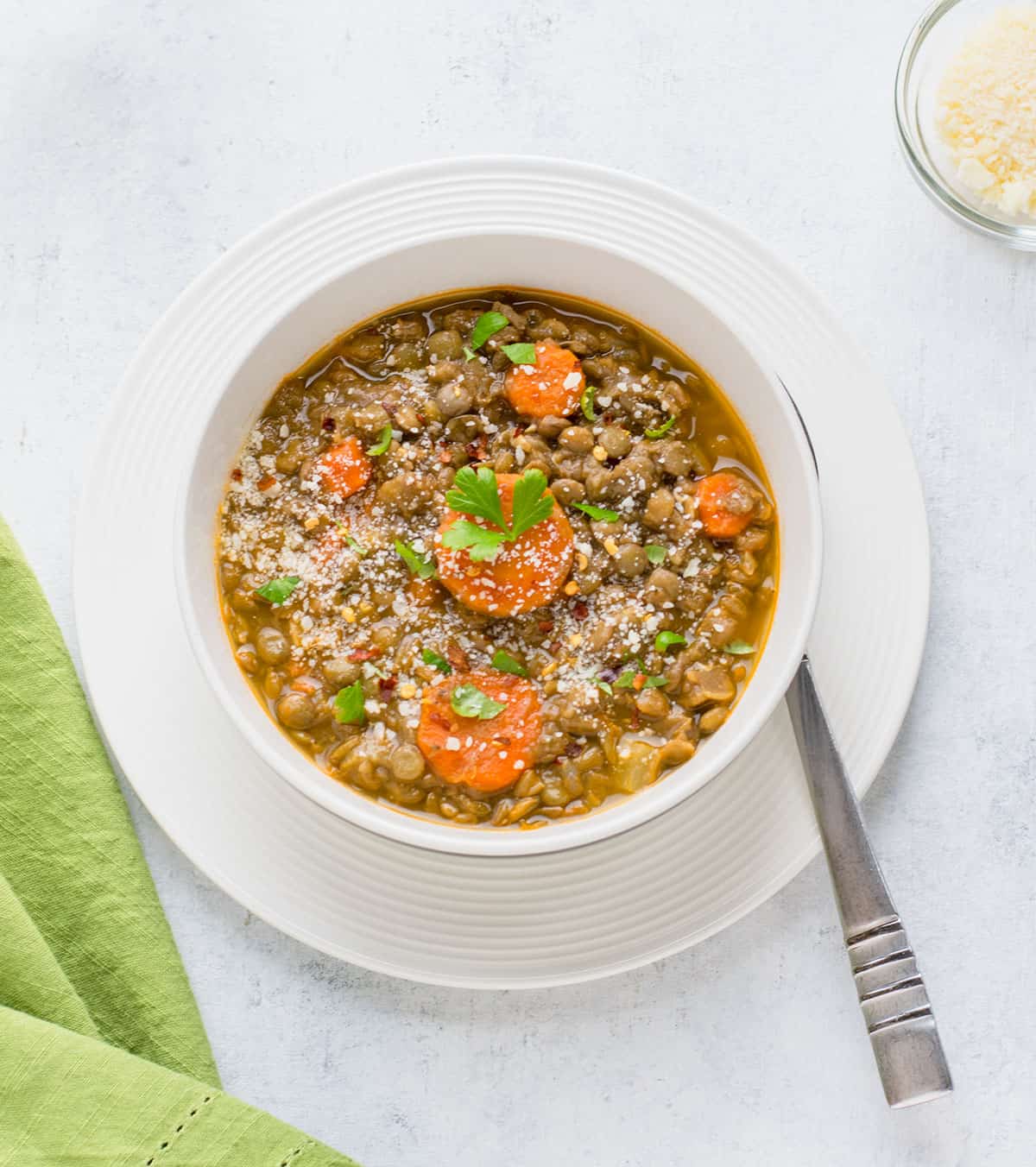 overhead view of bowl of Mediterranean lentil soup.