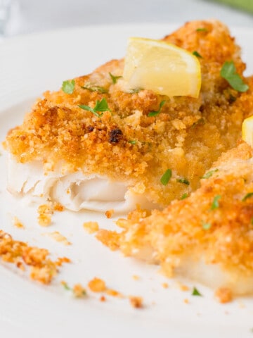 closeup of baked cod with bread crumbs