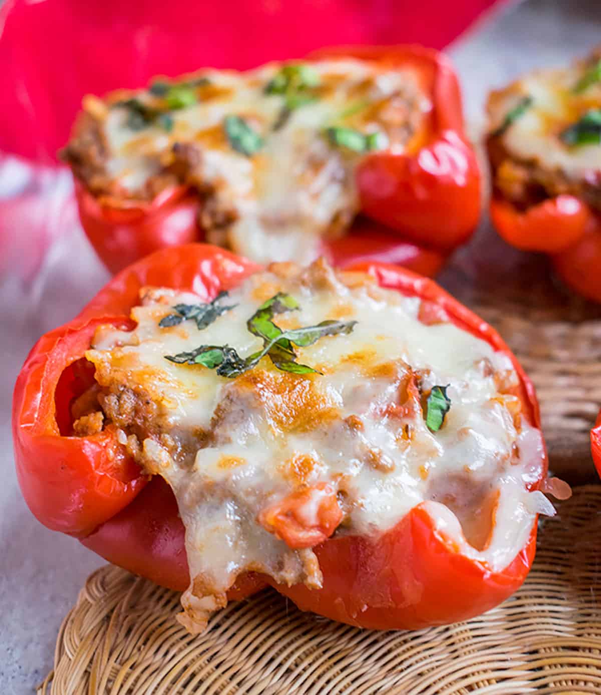 closeup of stuffed pepper half with melted cheese