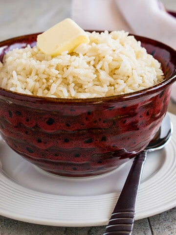 bowl of white rice with butter