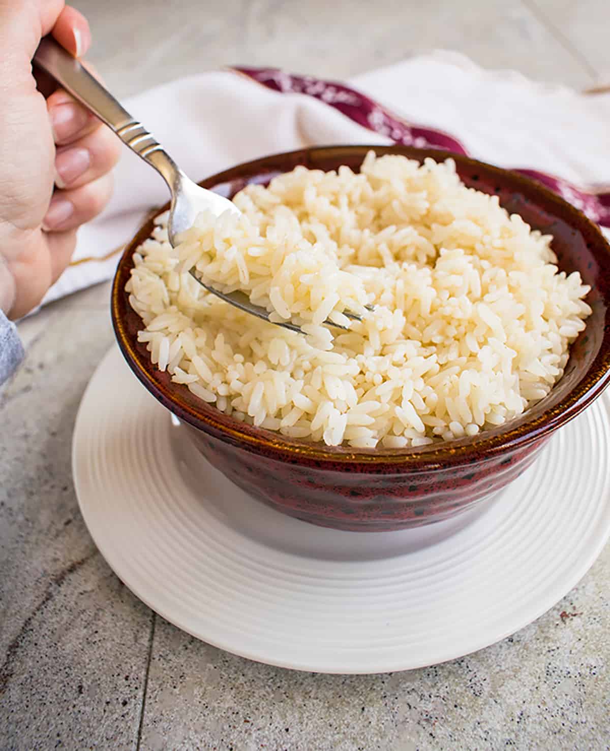 forkful of rice from bowl