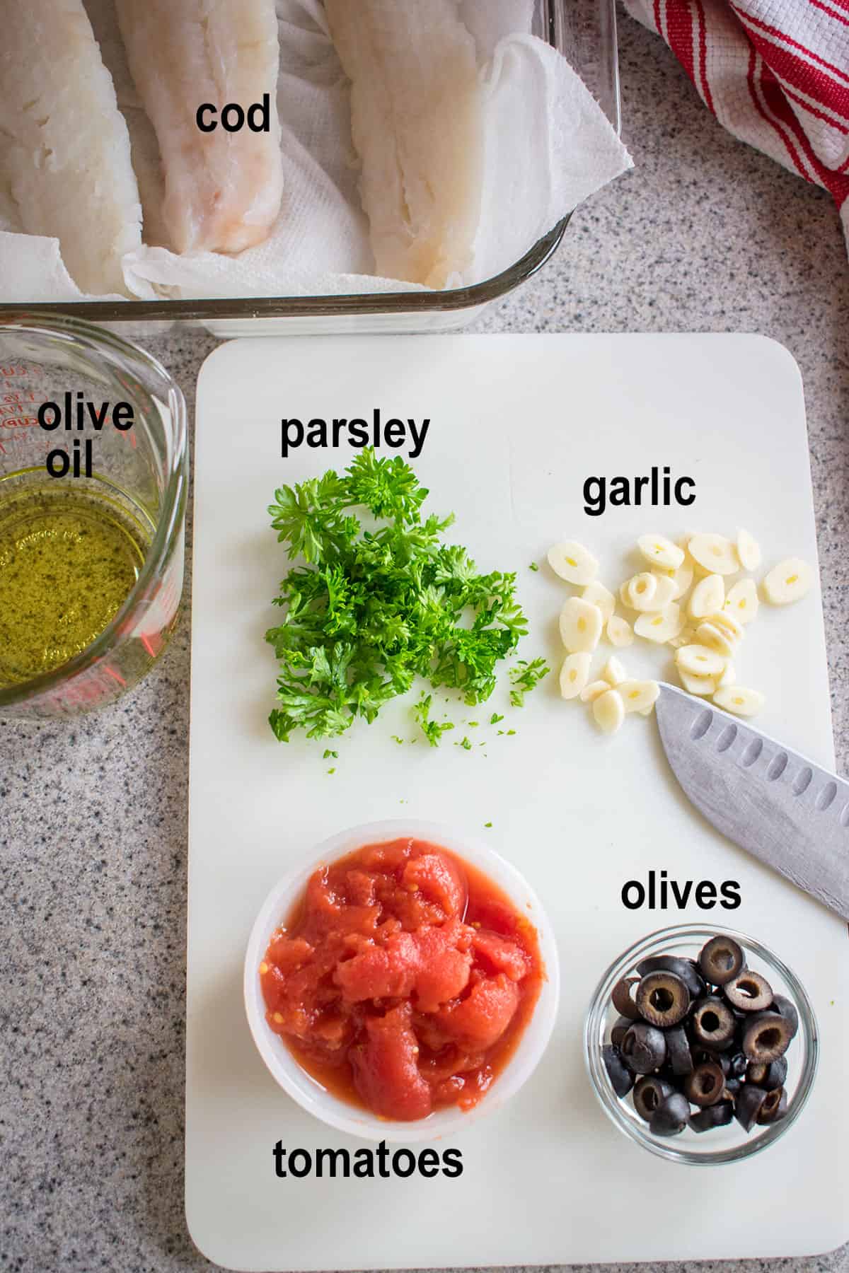 raw cod, parsley, garlic, olives, tomatoes, oil
