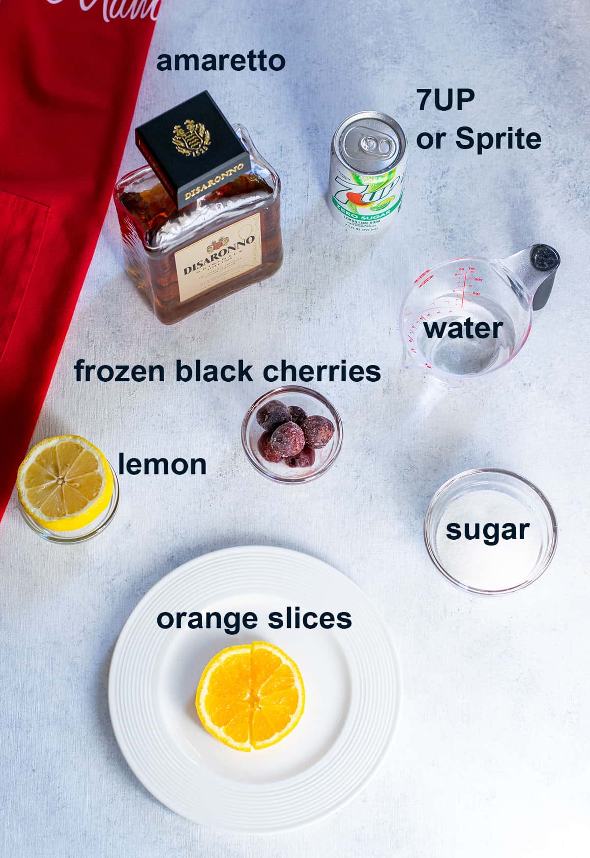 amaretto, 7UP, black cherries, water, sugar, lemon half, orange slices