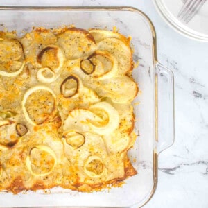 pan of crispy thin sliced potatoes with onions