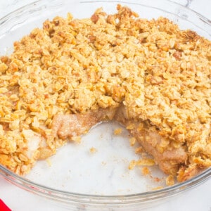 closeup of inside of pear crisp in glass pie dish