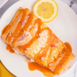 salmon with Buffalo sauce, red onions, mayo and lemons