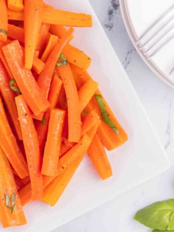 carrot salad on white platter