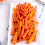 platter of carrot salad with basil