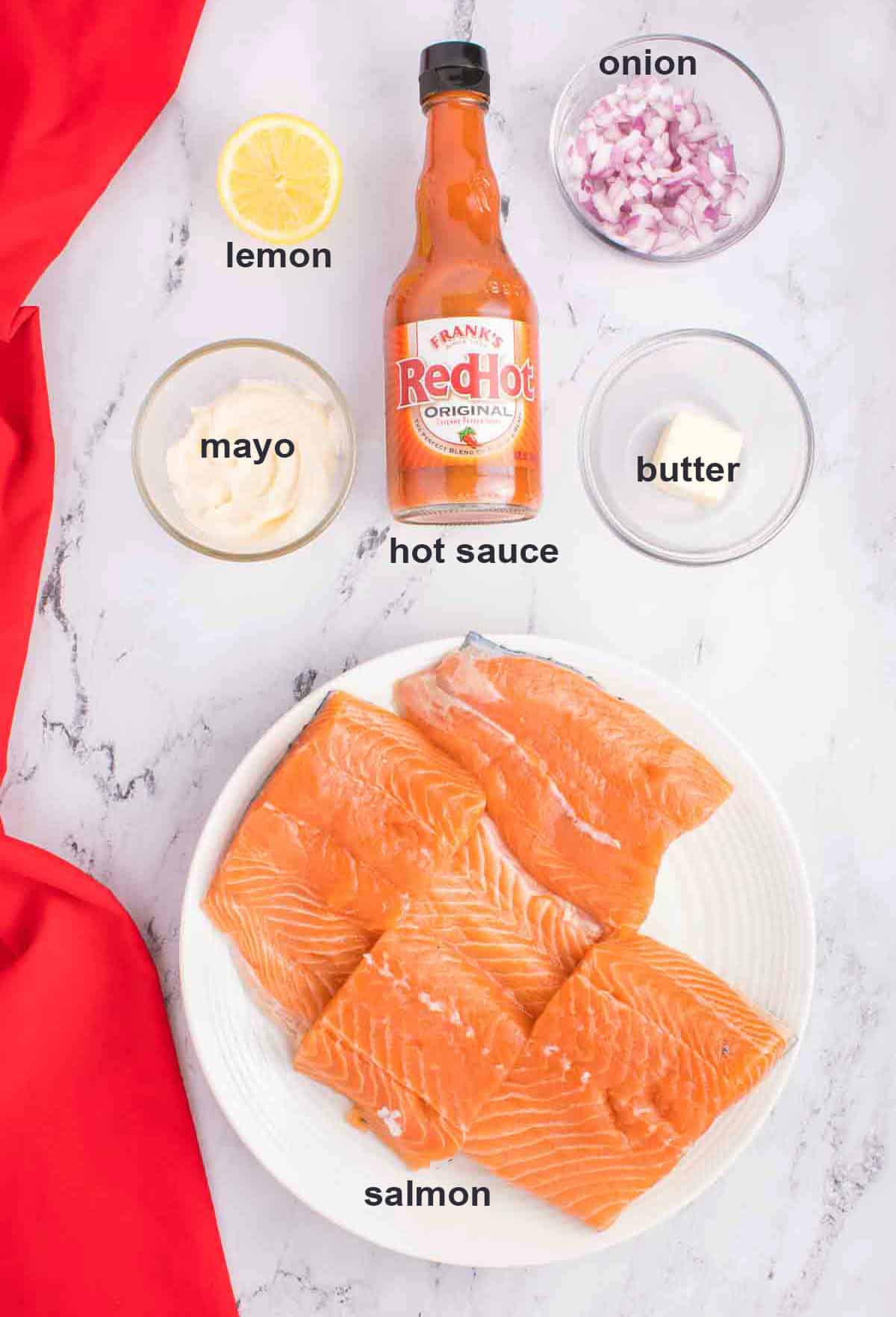 raw salmon, hot sauce, mayo, butter, lemon, chopped red onions