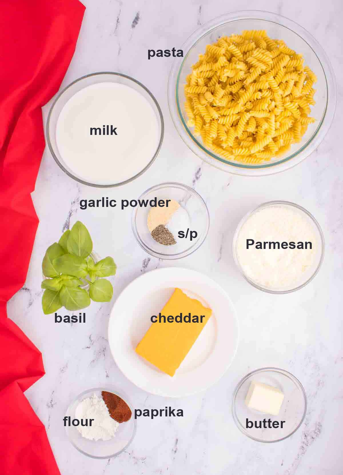 pasta, milk, Parmesan, cheddar, butter, seasonings, basil