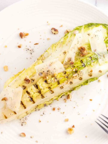 grilled romaine heart with walnuts, shaved Parmesan and vinaigrette