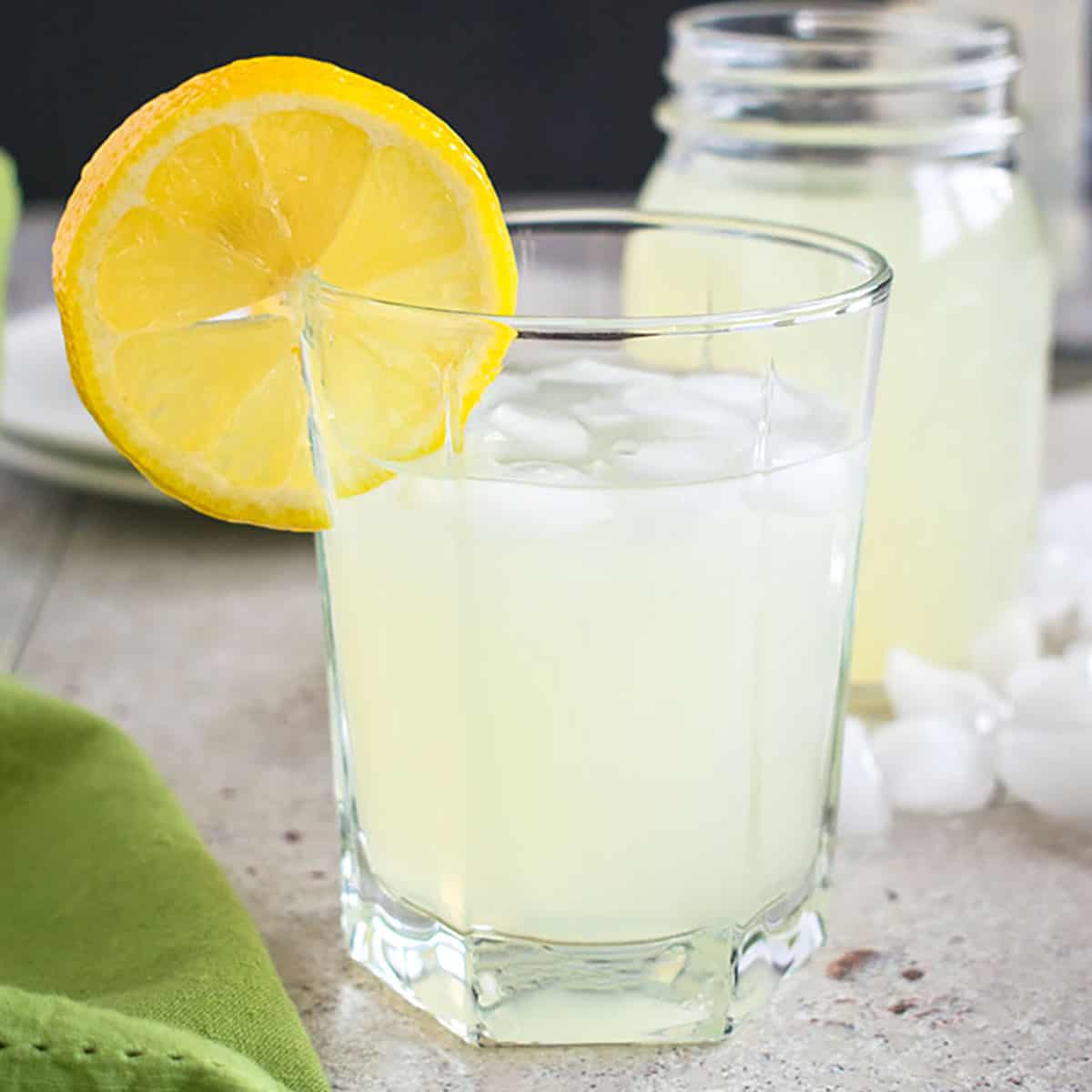 lemonade moonshine in a glass with a lemon slice