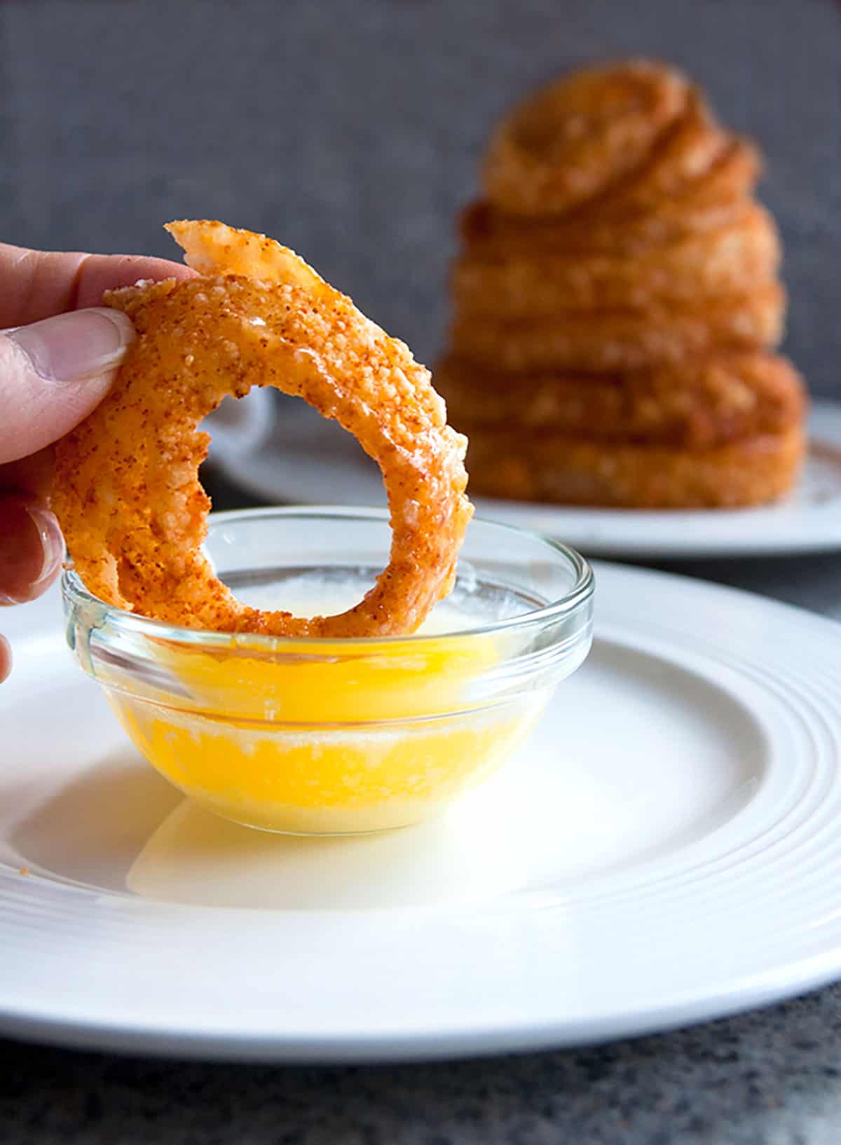 onion ring dipped in butter