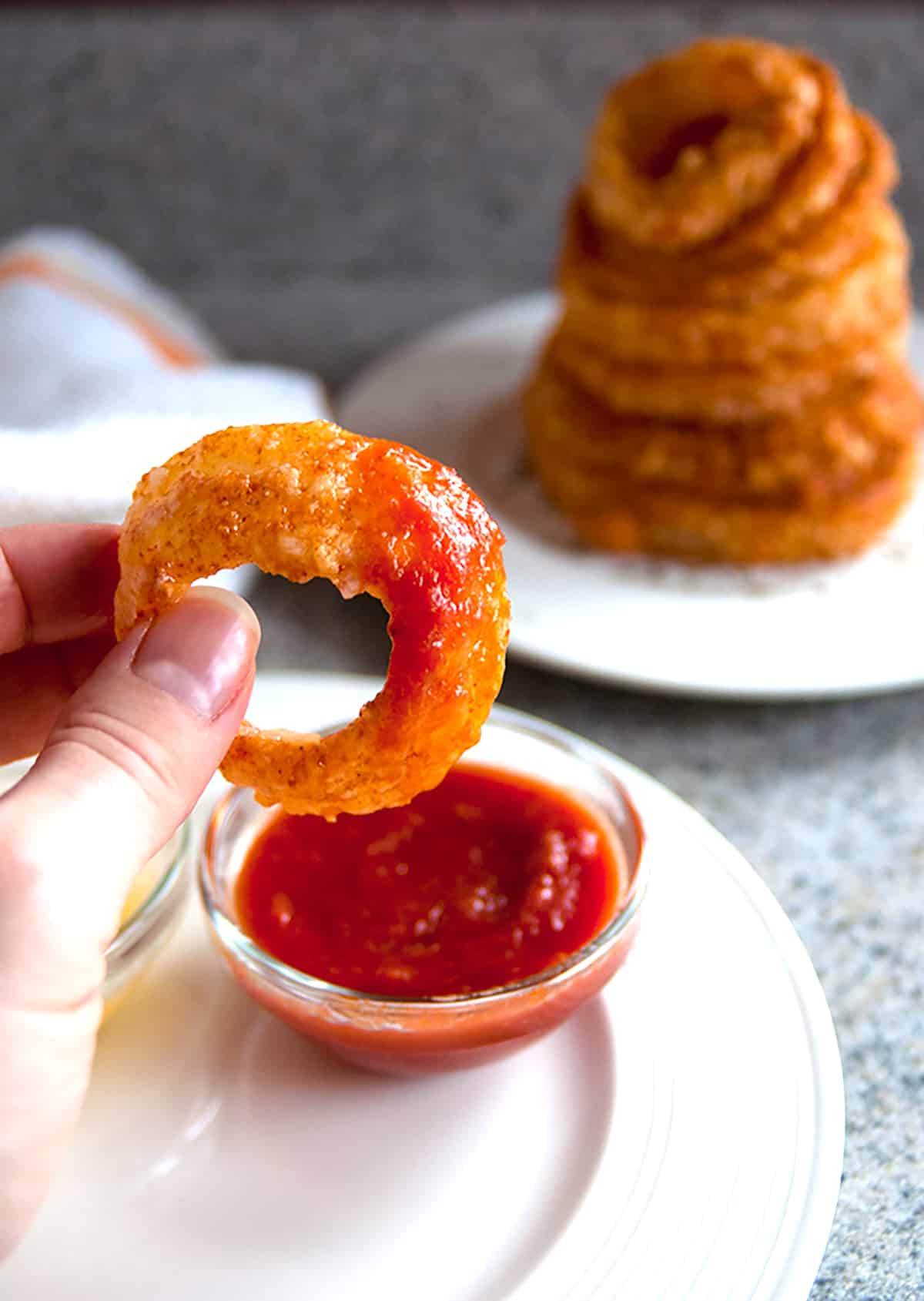 onion ring dipped in sauce.