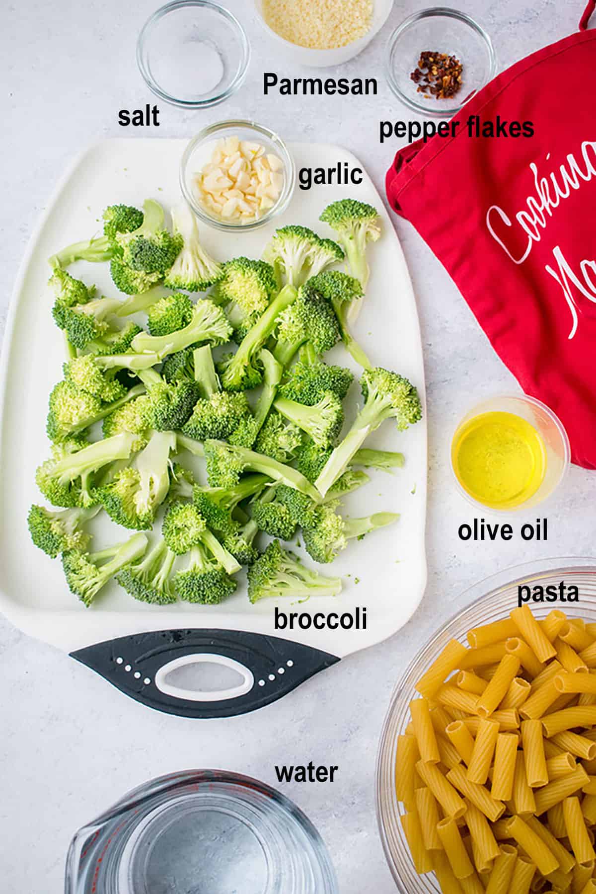 parmesan, salt, pepper flakes, garlic, oil, broccoli, pasta, water.