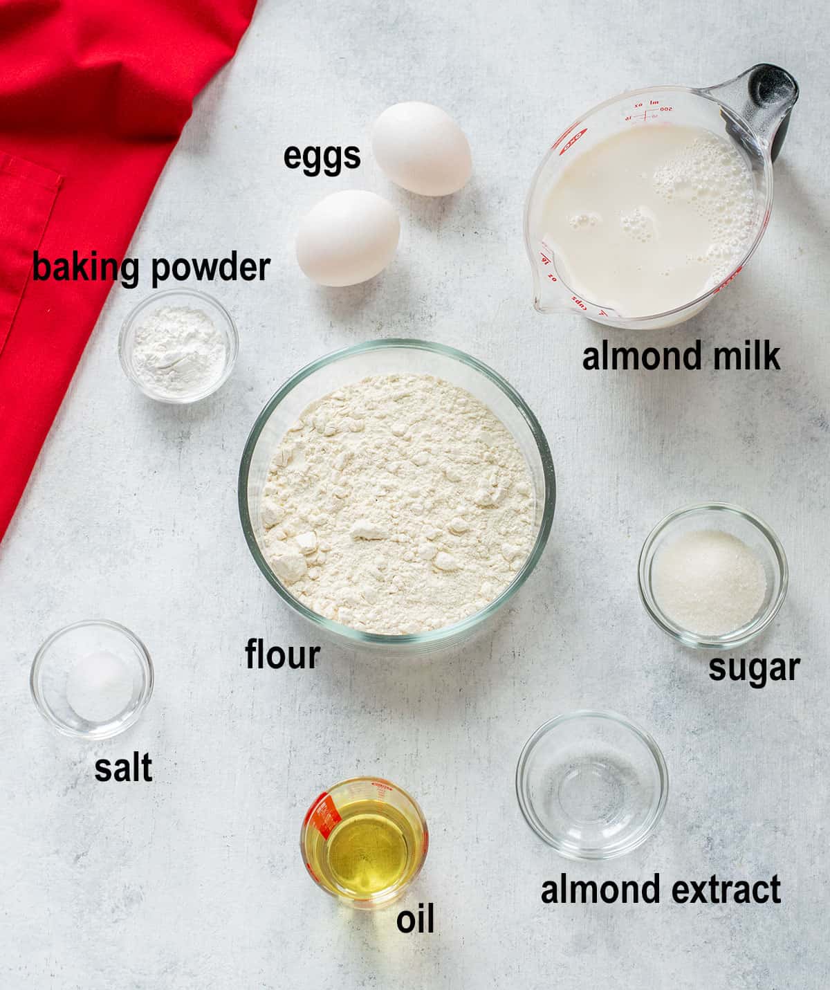 baking powder, eggs, almond milk, salt, flour, sugar, oil, almond extract