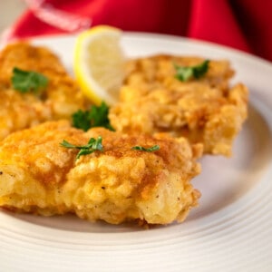 plate of fried baccalà (salted cod fish) garnished with parsley