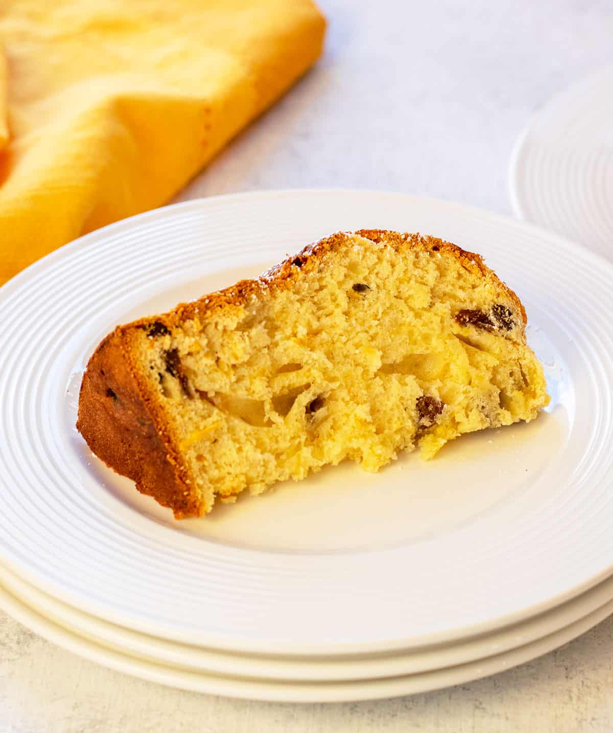 slice of panettone on a stack of plates