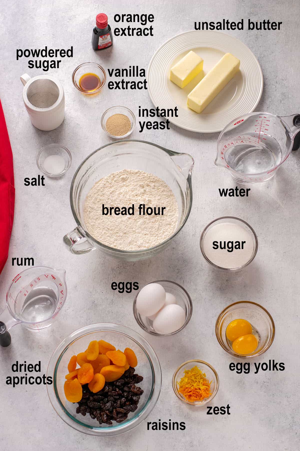 orange & vanilla extract, sugar, butter, flour, yeast, salt, water, rum, eggs, fruit