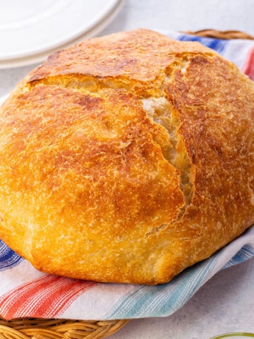 loaf of crusty italian bread in a basket