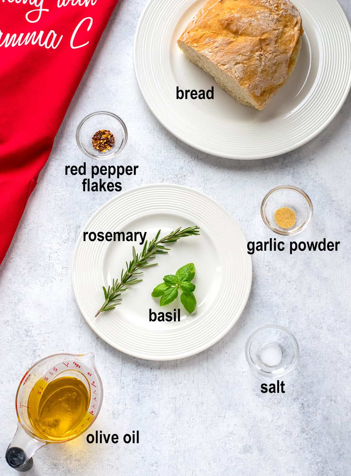 bread, red pepper flakes, rosemary, garlic powder, basil, olive oil, salt.