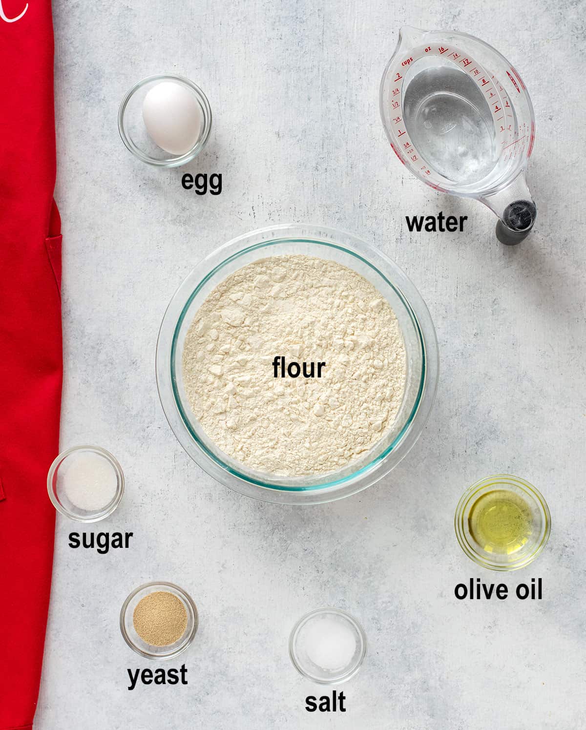 egg, water, flour, sugar, yeast, salt, olive oil