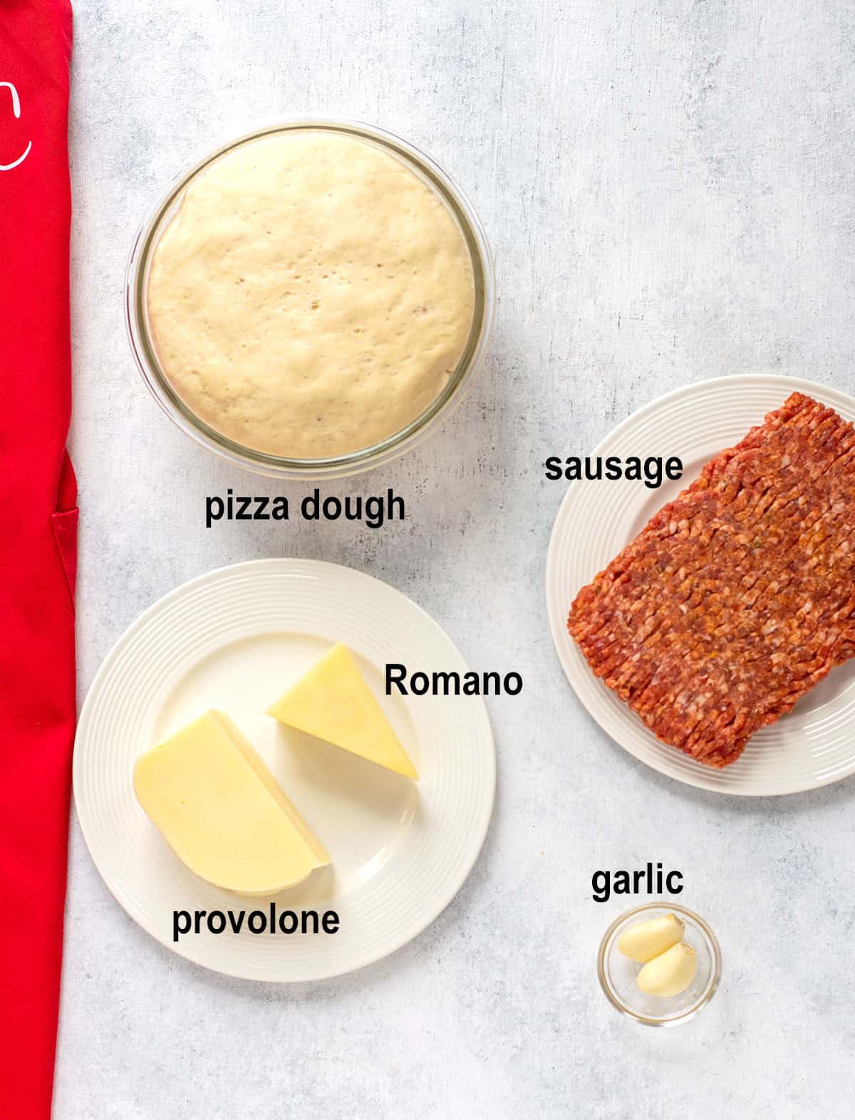 pizza dough, sausage, romano, provolone, garlic.