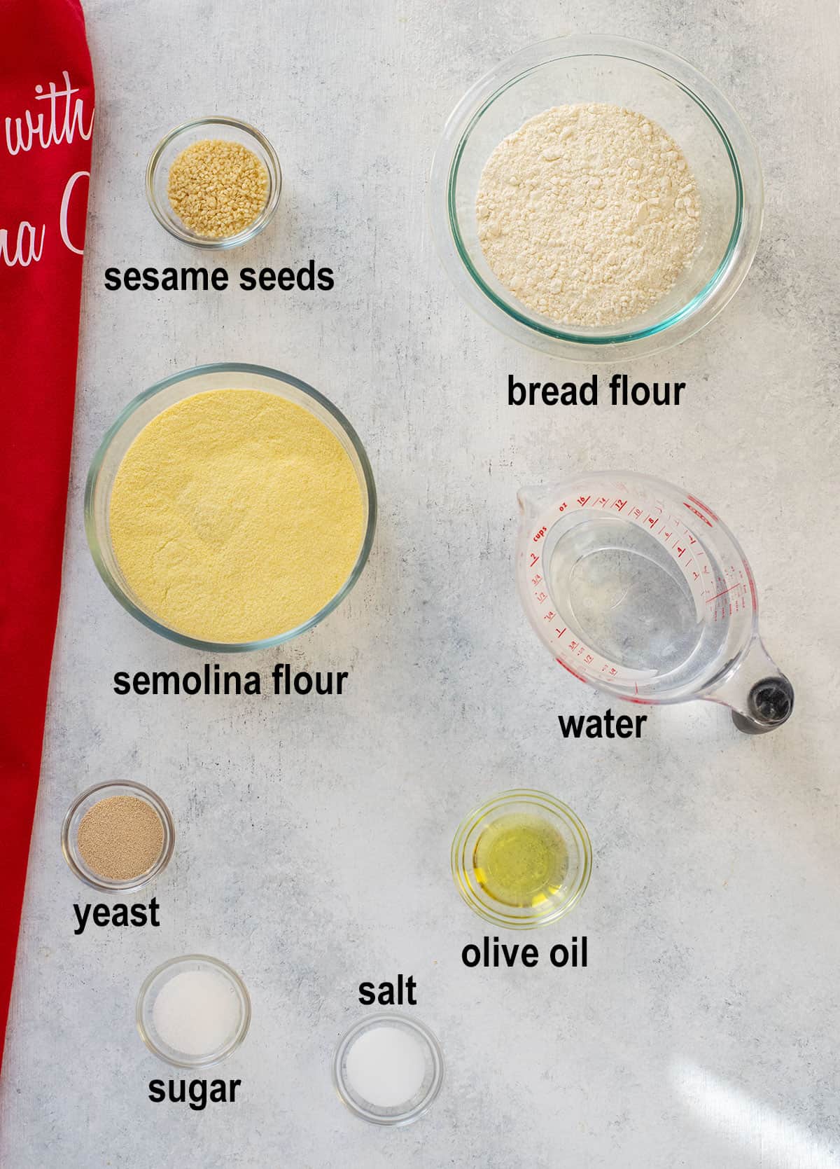 sesame seeds, bread flour, semolina flour, water, yeast, olive oil, sugar, salt