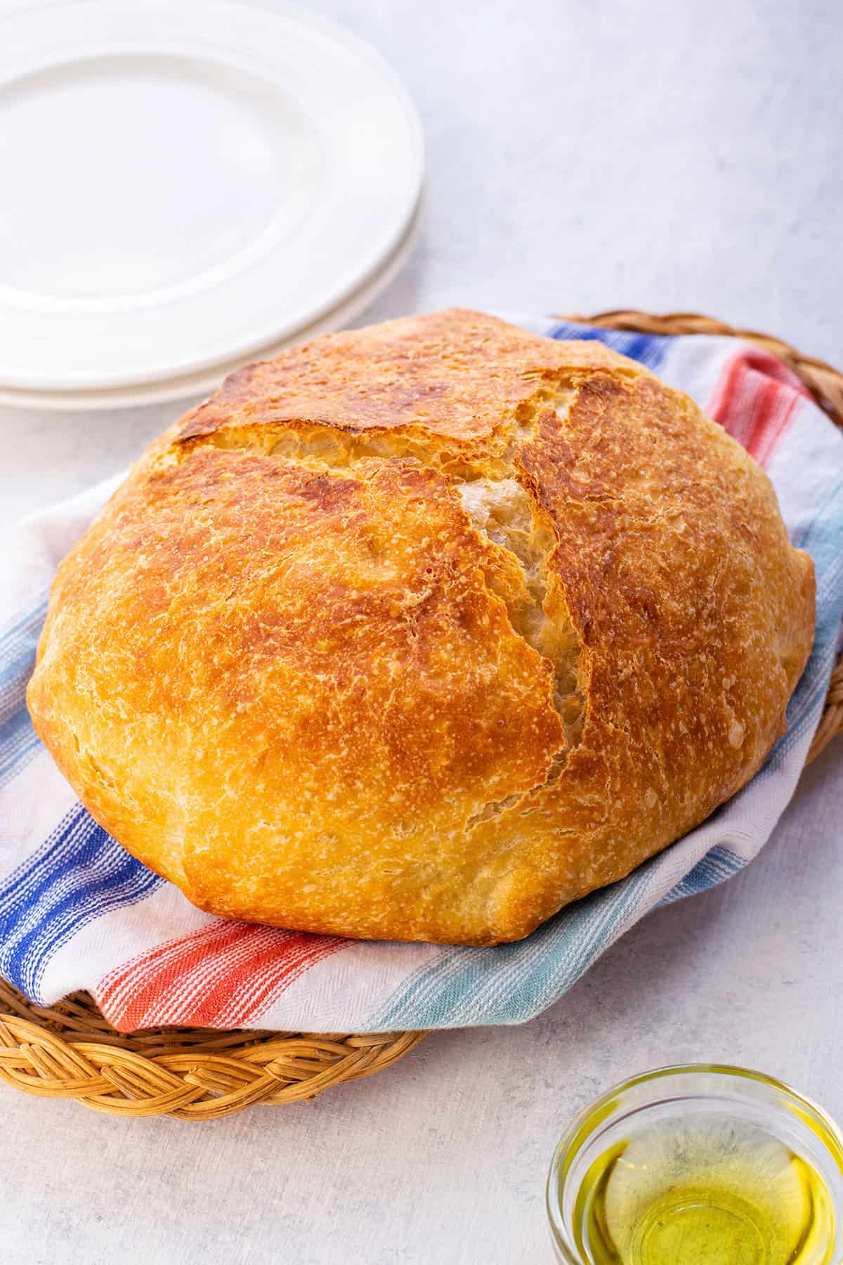 loaf of crusty italian bread in a basket
