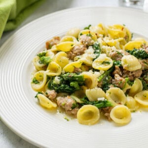 plate of orecchiette pasta with sausage and rapini (broccoli rabe)