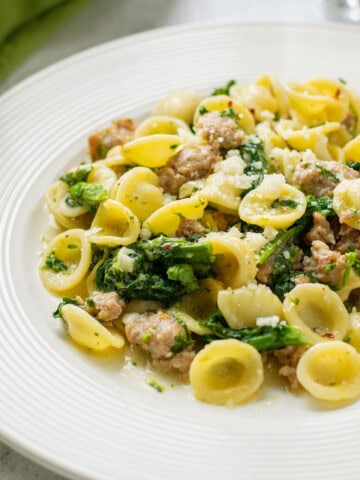 plate of orecchiette pasta with sausage and rapini (broccoli rabe)