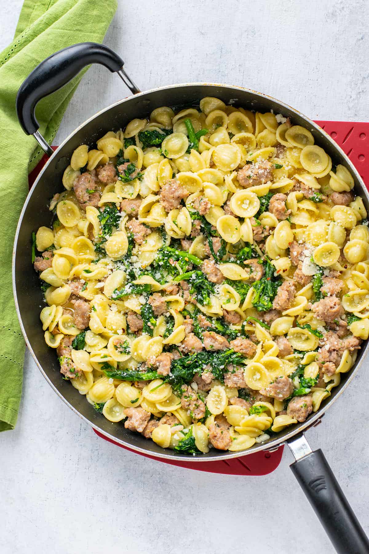 pan of orecchiette pasta with sausage and rapini (broccoli rabe)