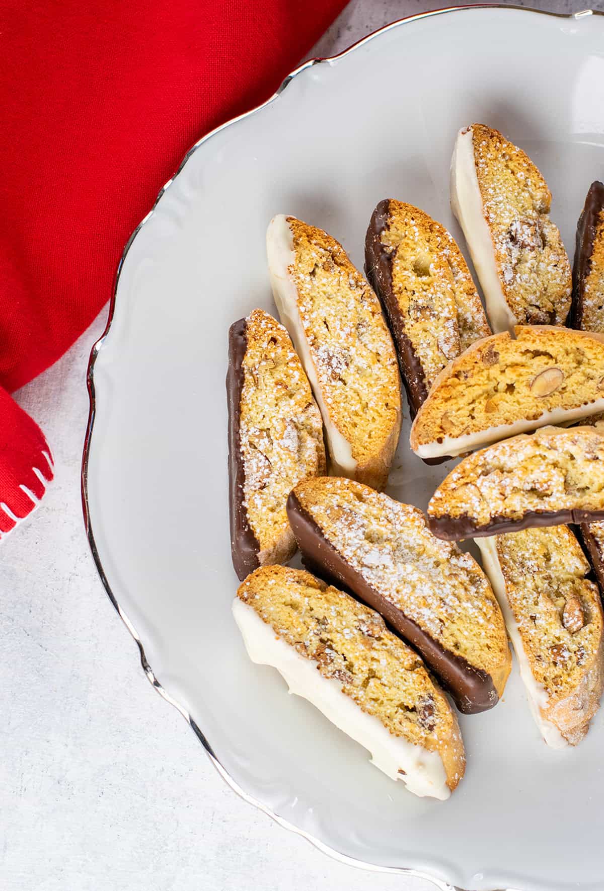 platter of white and dark chocolate dipped almond biscotti