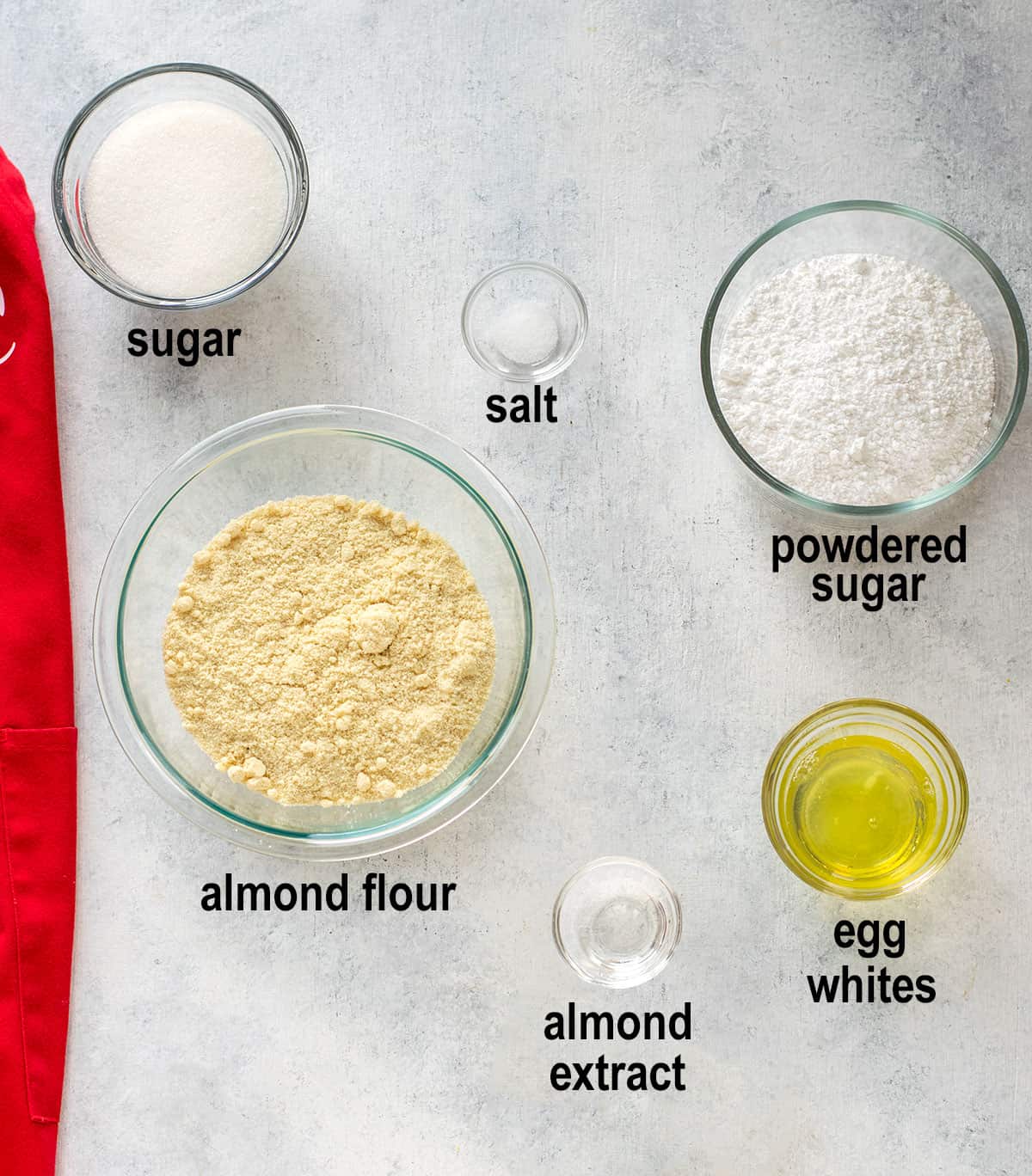 sugar, salt, powdered sugar, almond flour, almond extract, egg whites