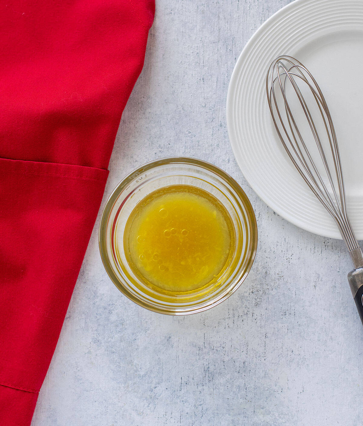 lemon vinaigrette ingredients mixed in bowl