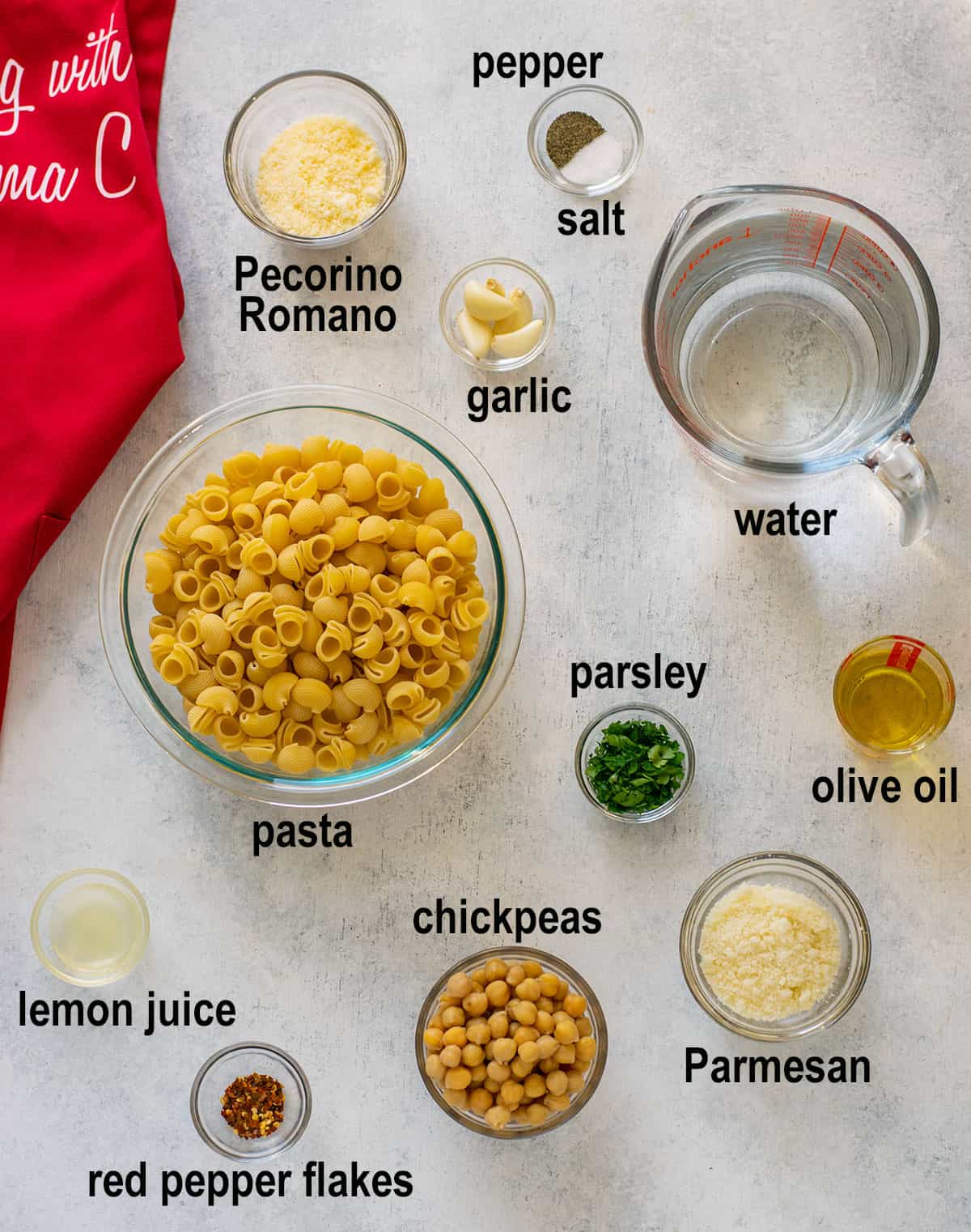pasta, cheeses, spices, water, chickpeas, olive oil. lemon juice, parsley