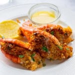 plate of stuffed shrimp scampi with lemon and butter