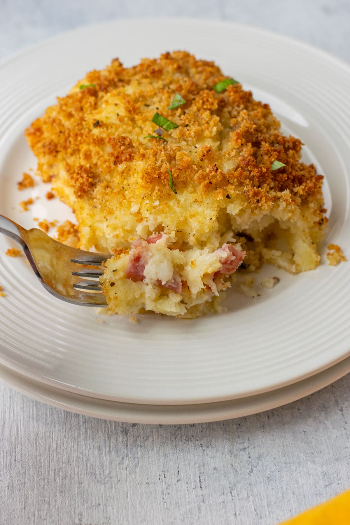 slice of gattò di patate (Italian potato casserole) on a plate