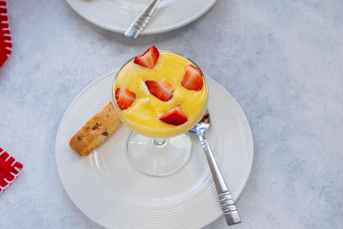 italian custard in glass with strawberries